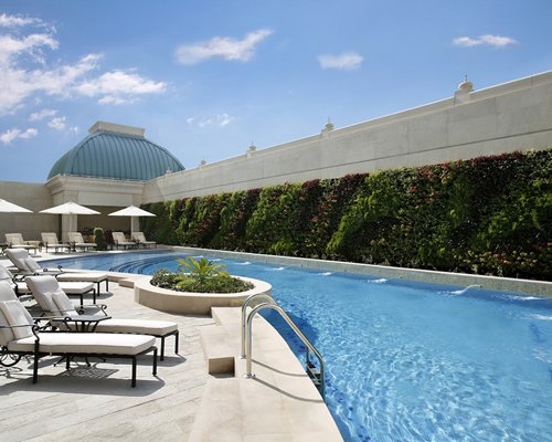 Relaxing pool area at Habtoor Palace Resort