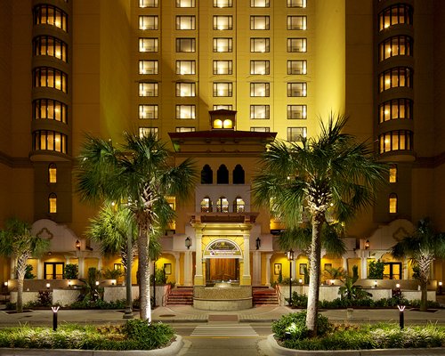 An exterior view of the resort main building with the signboard.