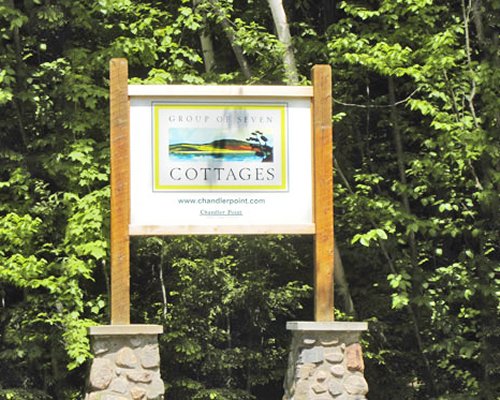 Signboard of Group of Seven Cottages.