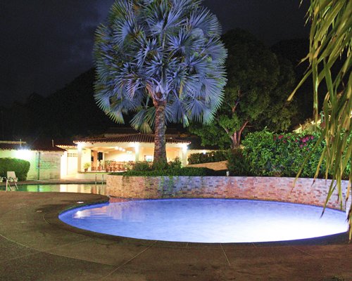 Outdoor swimming pool and hot tub.