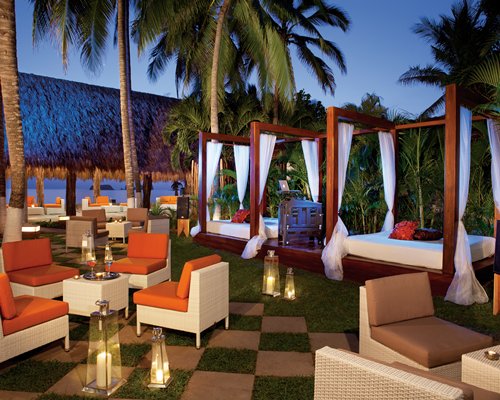 A well furnished outdoor lounge area.