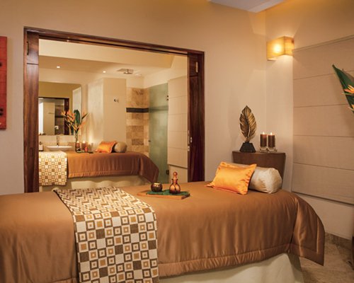 An indoor well furnished spa area.
