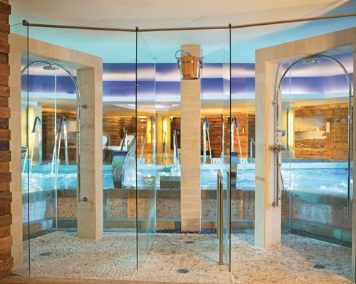 Entrance to the indoor swimming pool with water curtains.