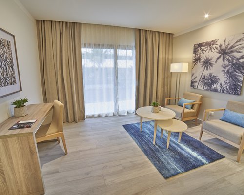 A well furnished bedroom with two beds.