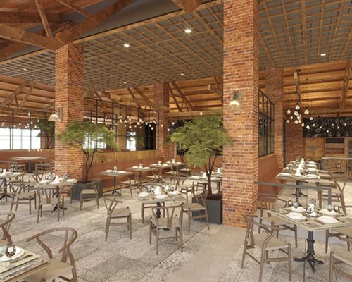 An indoor fine dining restaurant with multiple dining tables.