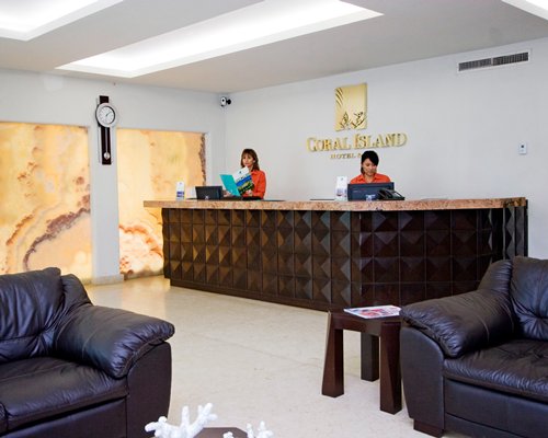 The reception area at Coral Island Hotel & Spa resort with lounge access.