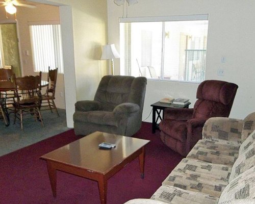 Living room with dining area and outside view.