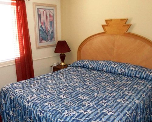 A well furnished bedroom with an outside view.