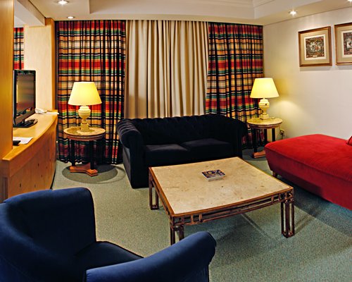 A well furnished living room with a television.