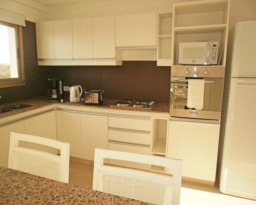 An open plan kitchen and dining area.