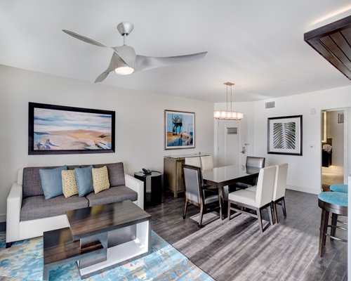 The Living room and Dining at The Reserve at Summer Bay Orlando By Exploria Resorts