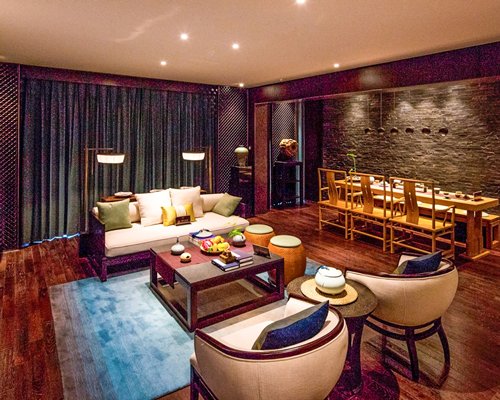A well furnished living room and dining area.