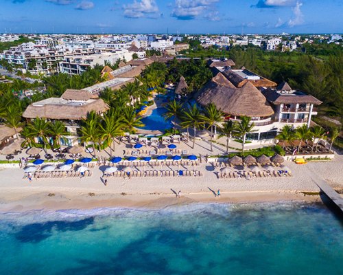 An aerial view of the resort property alongside the sea.