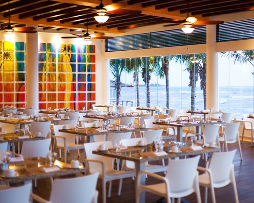 Indoor restaurant with ocean view.