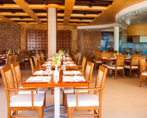 An indoor restaurant at The Reef Cocobeach.