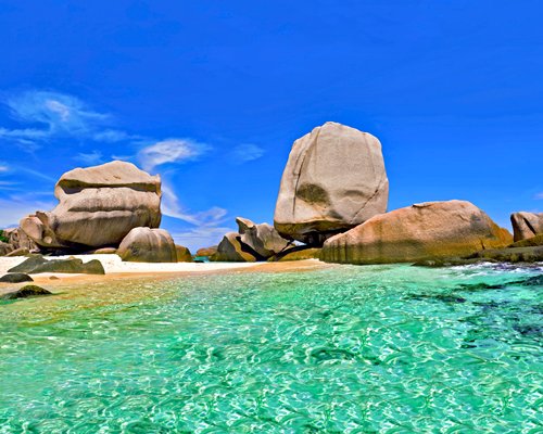 View of the ocean alongside rocks.