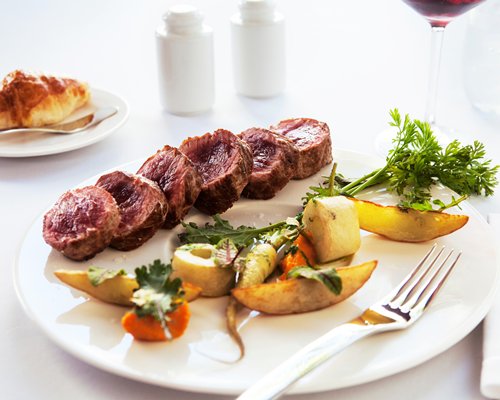 Garnished food on a plate.