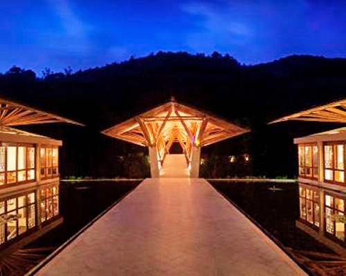 Exterior view of the resort units at night.