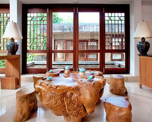 A well furnished indoor room with an outside view.