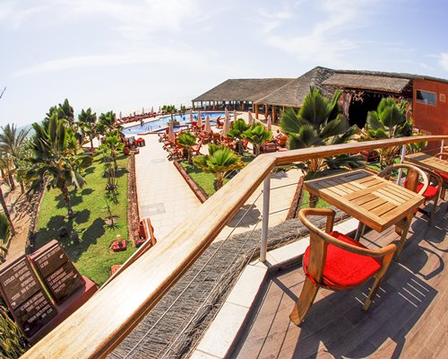 A balcony with patio furniture.