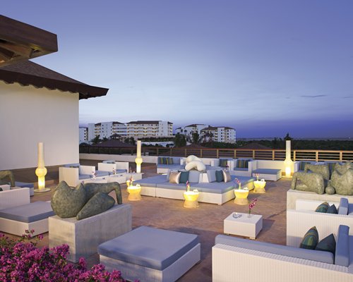 A well furnished outdoor lounge area.
