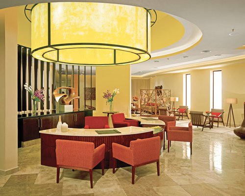 Reception and lounge area at Secrets Playa Mujeres Golf & Spa Resort.