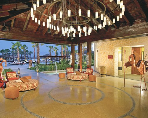 An indoor lounge area with an outside view.