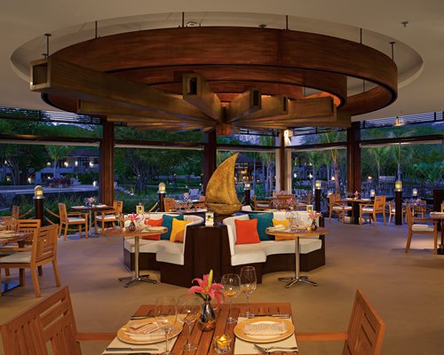 An indoor restaurant with outside view.