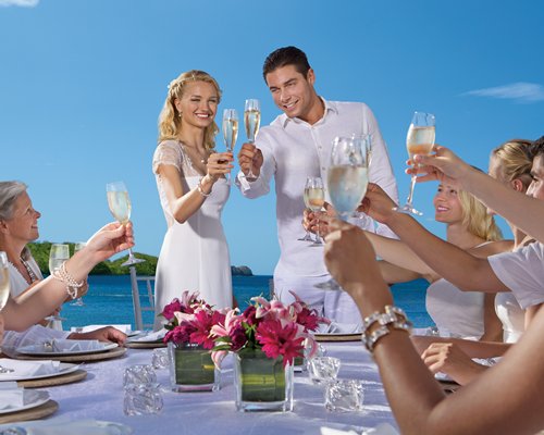 A group of people enjoying in an after wedding party.