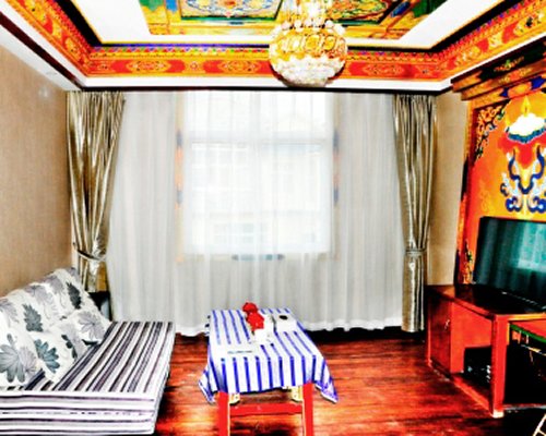 A well furnished living room with television.