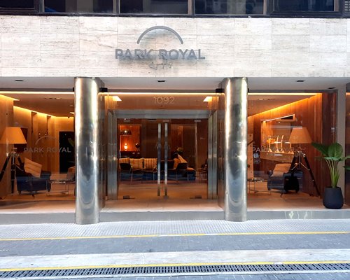 An exterior view of the Park Royal Buenos Aires resort at night.