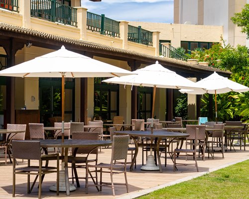 An indoor restaurant at Sauipe Resorts with outside view.