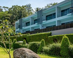 An outdoor swimming pool alongside multiple units.