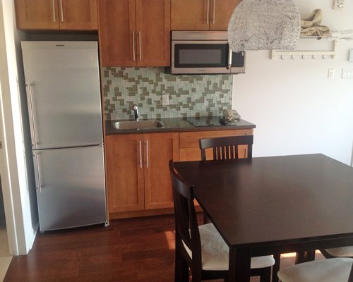 An open plan kitchen and dining area.