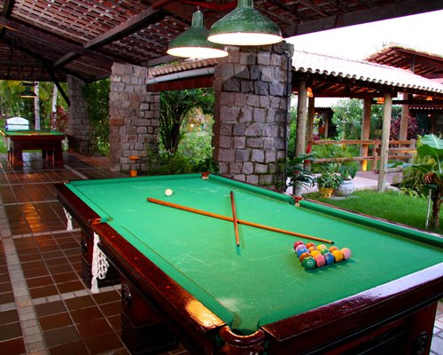 Recreation area with pool table and ping pong.