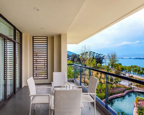 A balcony with patio furniture.