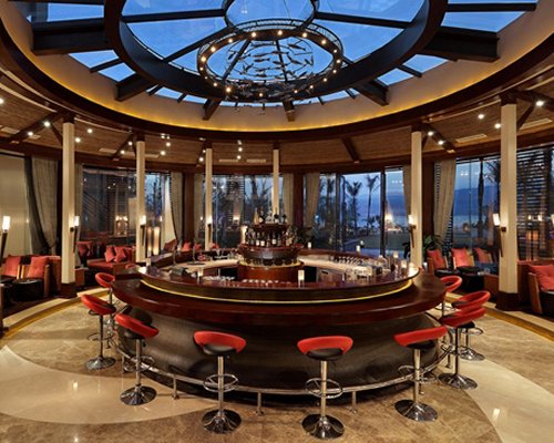 A well equipped indoor bar with lounge access.