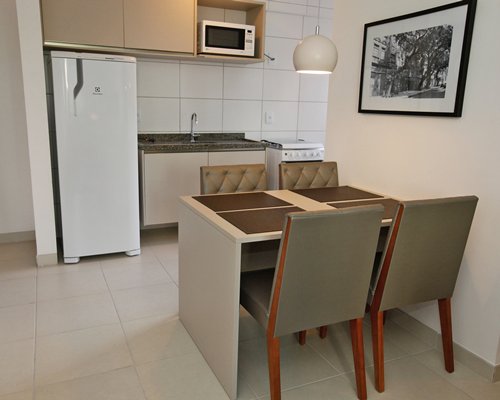 An open plan kitchen and dining area.