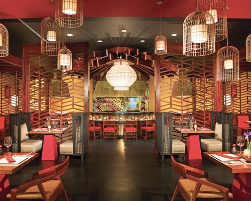 A well equipped indoor bar with dining area.