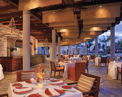 A fine dining restaurant with an outside view.