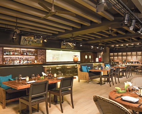 A well equipped an outdoor bar with a fine dining restaurant.