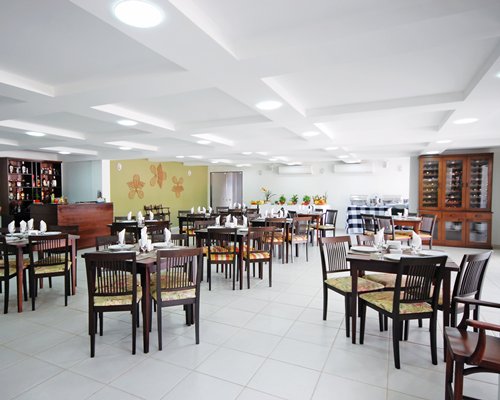 An indoor fine dining restaurant with bar.