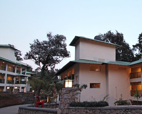 Scenic exterior view of Club Mahindra Mount Serene with a pathway.