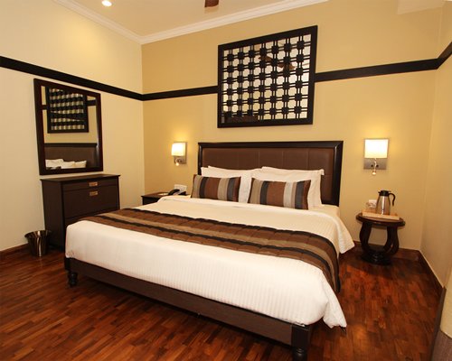 A well furnished bedroom with double bed.