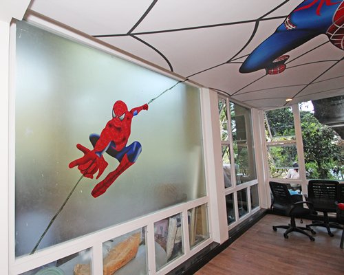 A well furnished spiderman themed indoor room.
