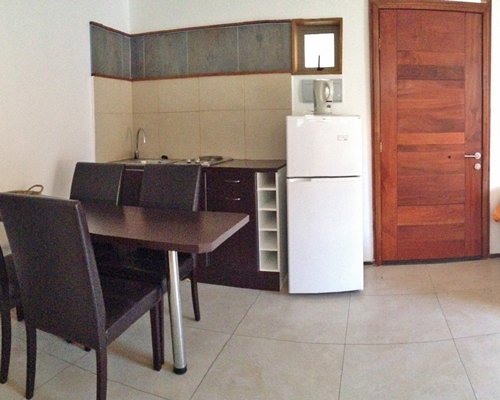 An open plan kitchen and dining area.