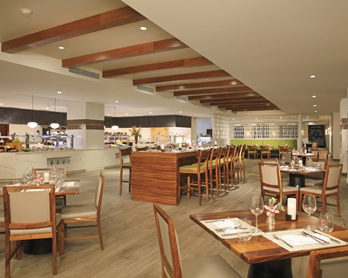 An indoor fine dining restaurant with a buffet area.