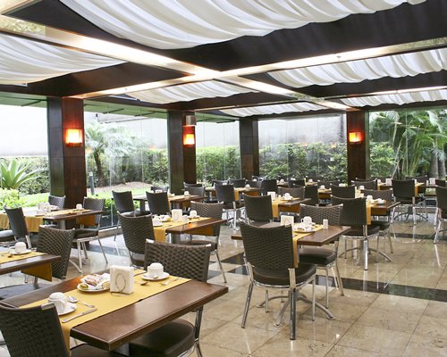 A fine dining restaurant with an outside view.