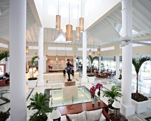 THE RECEPTION AREA WITH LOUNGE ACCESS.