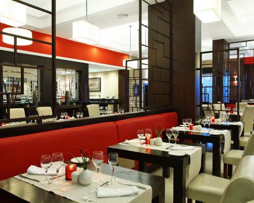 AN INDOOR RESTAURANT AT LUXURY BAHIA PRINCIPE BOUGANVILLE.